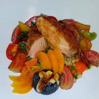 Duck over a barley salad and topped with a citrus glaze.|Tiffany Provinsさん