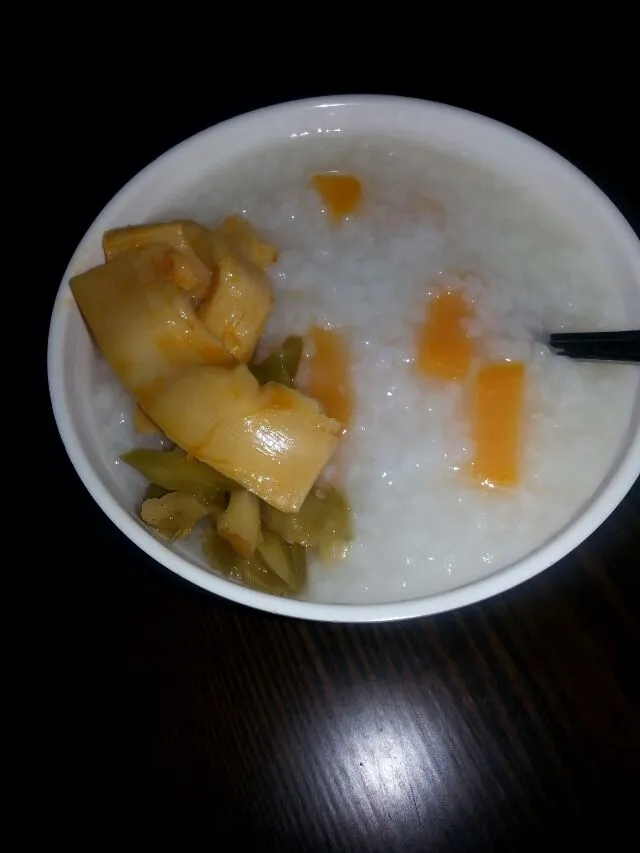 my breakfast at work.  sweet potato congee. I added bamboo shoots and pickLes.|Polly Gelfusoさん