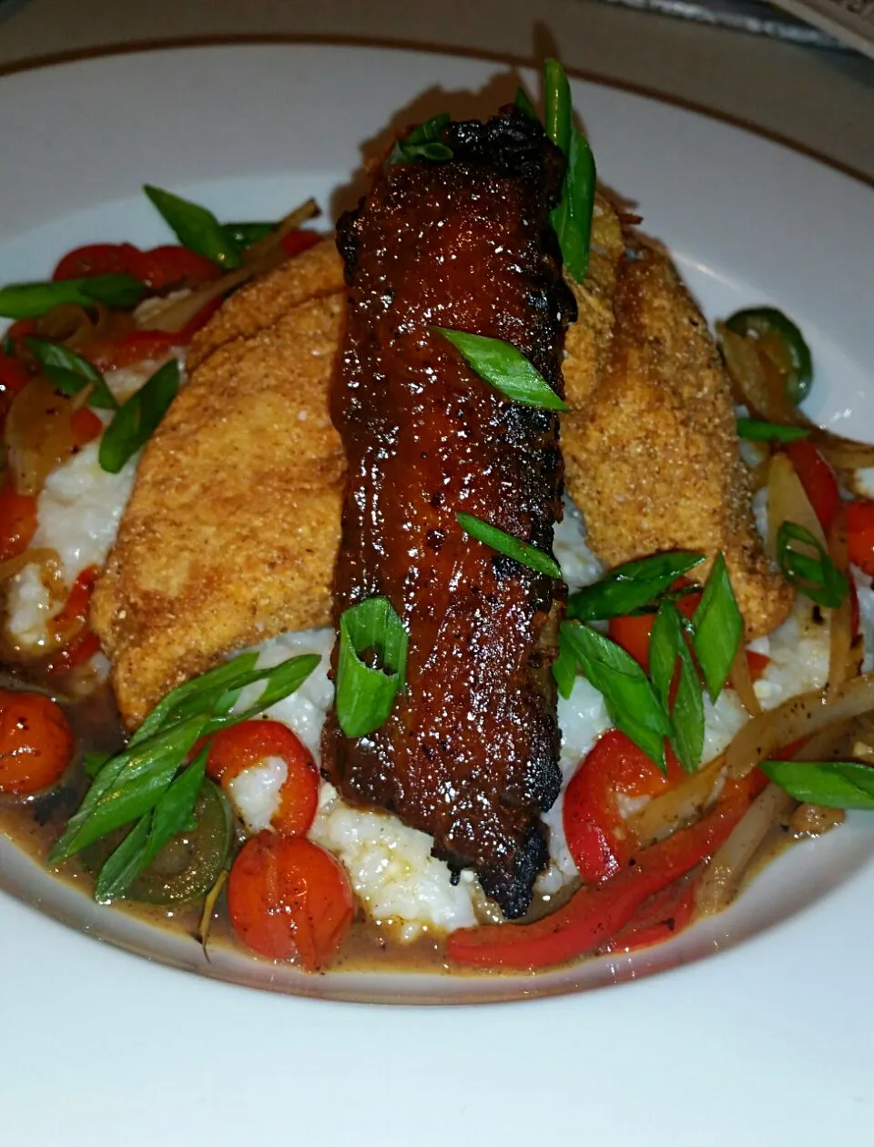 Snapdishの料理写真:fish and grits with crispy Pork belly....|Jenn Strangeさん