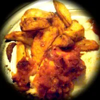 Snapdishの料理写真:Cajun Chicken with Garlic and Chilli wedges|Sammy Circlesさん