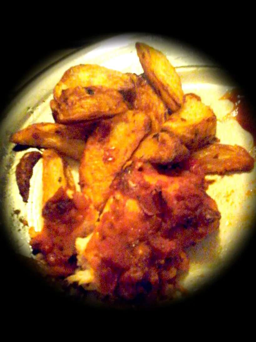 Snapdishの料理写真:Cajun Chicken with Garlic and Chilli wedges|Sammy Circlesさん