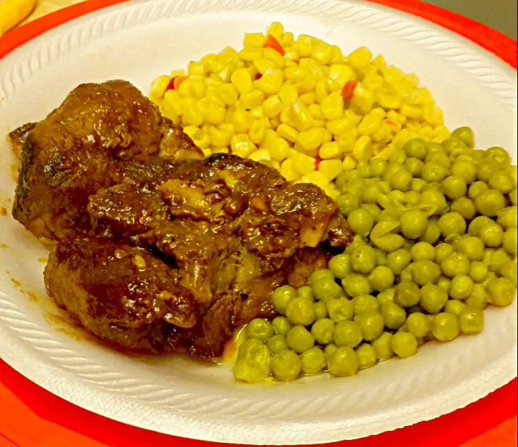 Snapdishの料理写真:Tender biased pork loin in sweet tamarind sauce sweet peas and Mexican corn #homecooks #goodeats|christl babcockさん