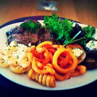 Sirloin steak, potato àu gratin, garlic roulé cheese on wild mushrooms with salad and fries.|Tommy Victor Spokes🍴🍝🍷さん