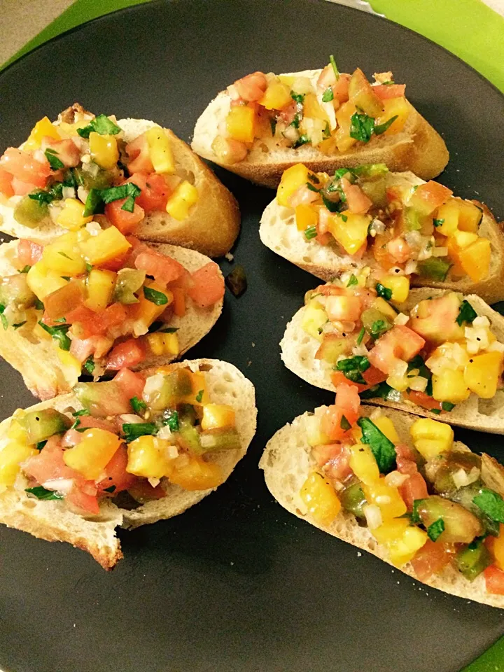 Snapdishの料理写真:Heirloom tomato bruschetta|Milka Papricaさん