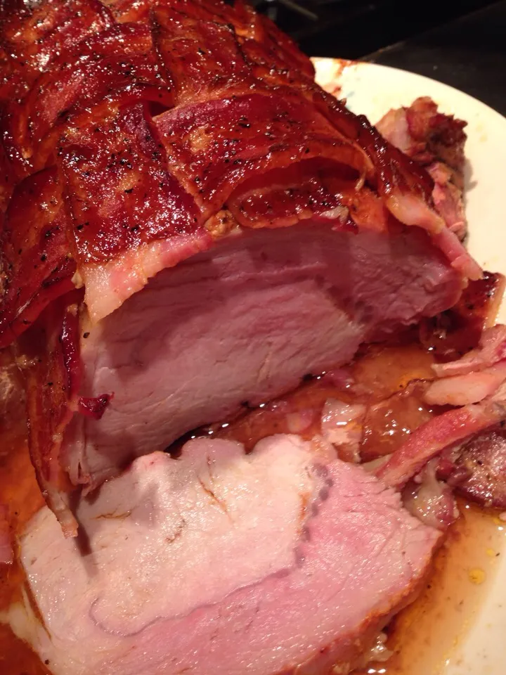 Bacon wrapped, smoked whole pork loin with BBQ glaze.|Mike Foshéeさん