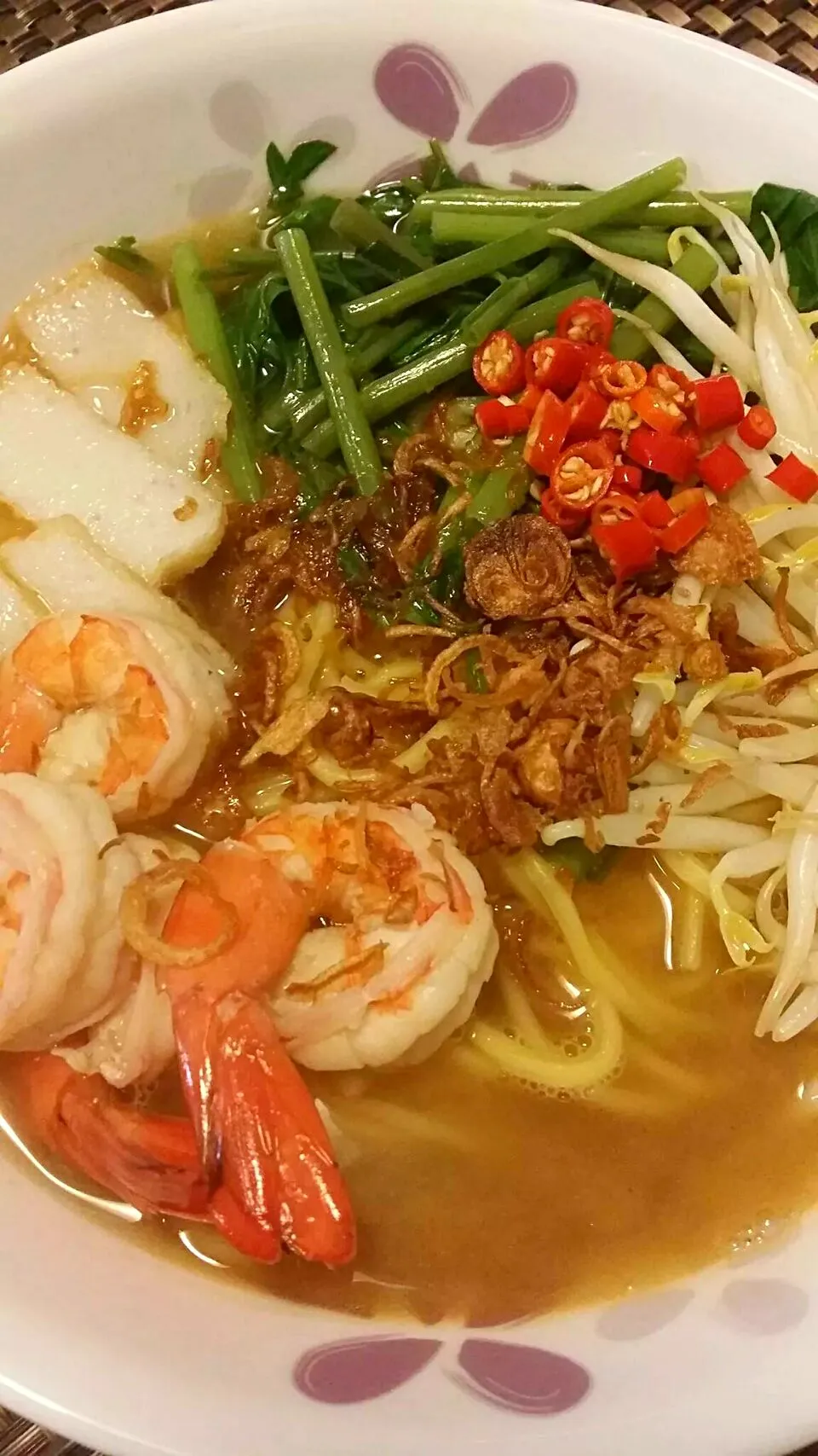 Asian prawn noodles. Sweet, pungent broth made from prawn shells and heads, chicken bones and star anise, boiled for 3 hours.|Ilya Ibrahimanさん