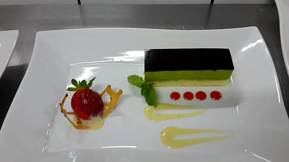 greentea mousse cake topped with chocolate glassing serve with vanilla sauce|David Kristiantoさん