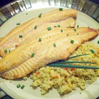 brined smoked catfish over a bed of cous cous|travis baeumelさん