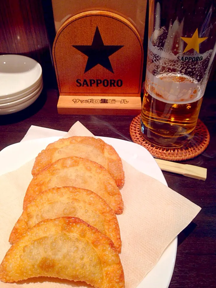 Snapdishの料理写真:スタービール＆揚げ餃子|Tarou  Masayukiさん