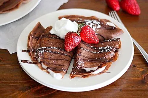 Snapdishの料理写真:Chocolate crepe, light whip cream strawberry and rich dark choco sauce|Andrew Martiniさん