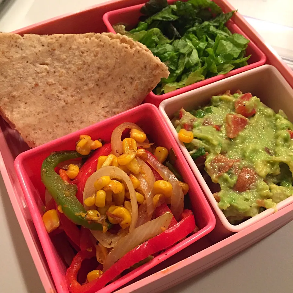 Whole wheat taco fajitas with fresh made guacamole, stir fried veggies and lettuce|victoria valerioさん