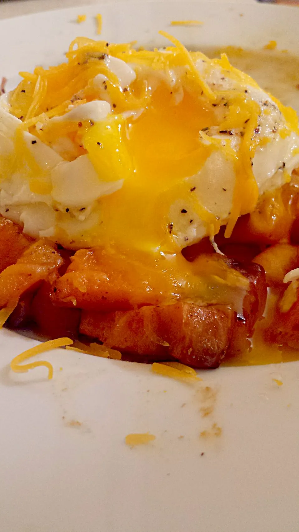 Snapdishの料理写真:roasted butternut squash and sweet potato hash topped with cheddar cheese and poached eggs|Brianaさん