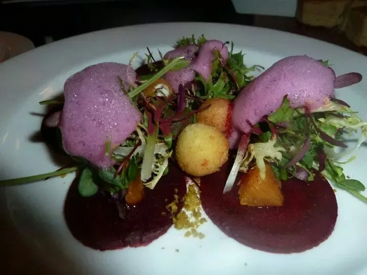 beet carpaccio. cara cara oranges, pistachio crumbles, chevre chz, and beet foam.|Polly Gelfusoさん