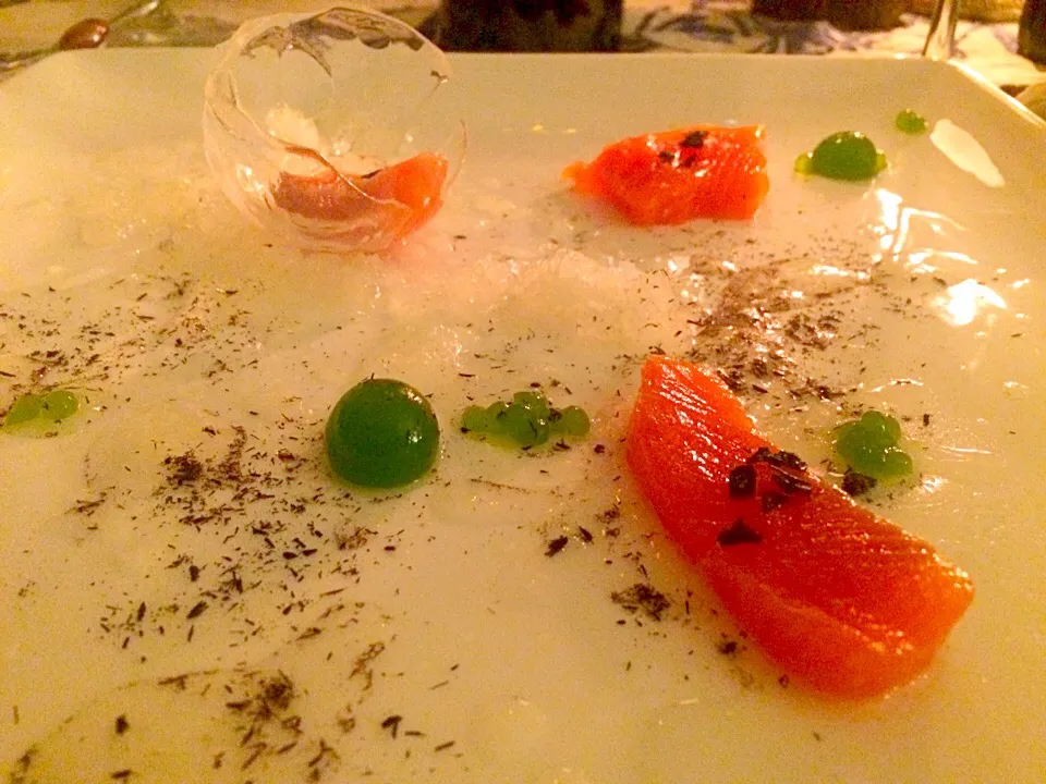 Quick cured salmon with lemon s ow, pine needle roe in an ice sphere|cari gennarelliさん