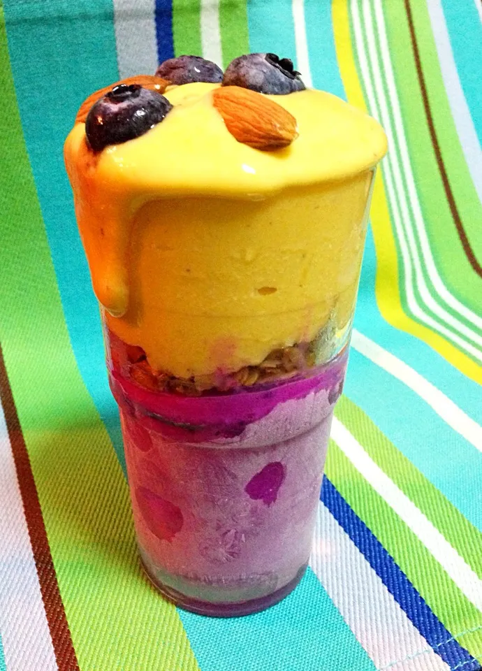 Snapdishの料理写真:Duo colored smoothie - red dragonfruit tofu(bottom) & pumpkin tofu(top) with coconut granola in between 😁|coxiella24さん