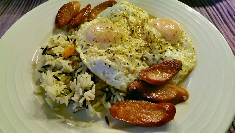 brown & wild rice with carrots, herb fried eggs and chorizo #Breakfast/Brunch|Tricia Bouttéさん