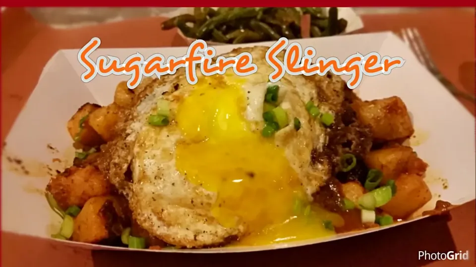 Snapdishの料理写真:Slinger at Sugarfire BBQ: brisket hash topped brisket chili, burger, cheese and a fried egg on top with a side of green beans  (^^)!|Jihollandさん