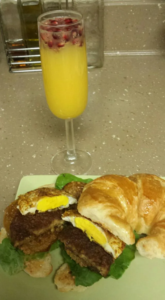 Breakfast croissant.   #croissant #egg #sausage #orangejuice #pomegrante|Culinary Kissesさん