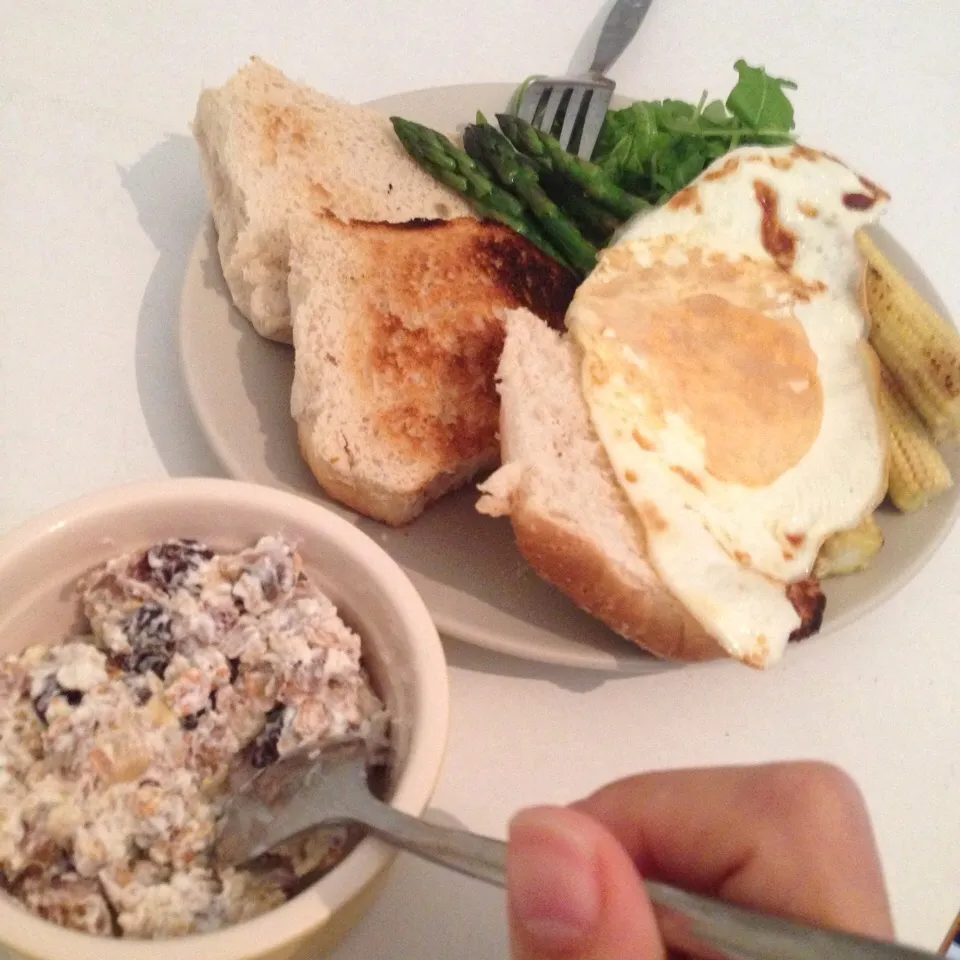 Snapdishの料理写真:Top-up my energy in the morning! Fruits mixed museli & Yogurt, Bread, Fried egg, Asparagus, Baby corns, Rocket leaves|Meeさん