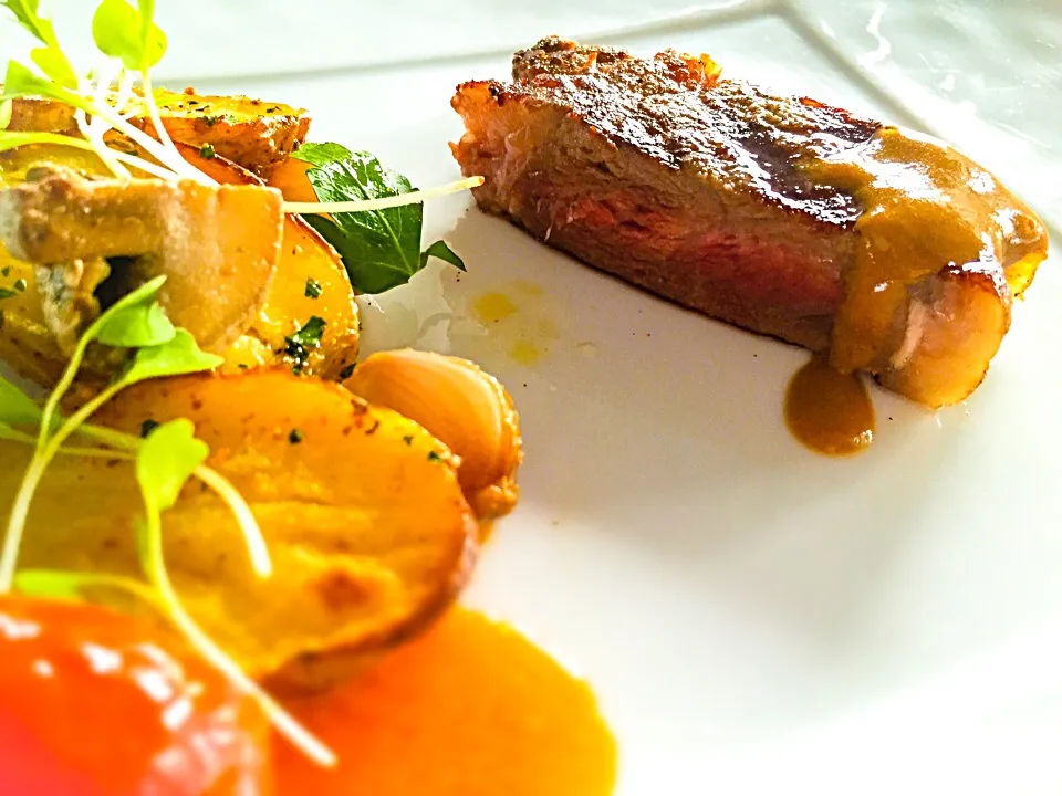 Grilled m6 sirloin from Australia, foie gras sauce and melts potatoes, small onion cooked in beef glazed.|chef louisさん