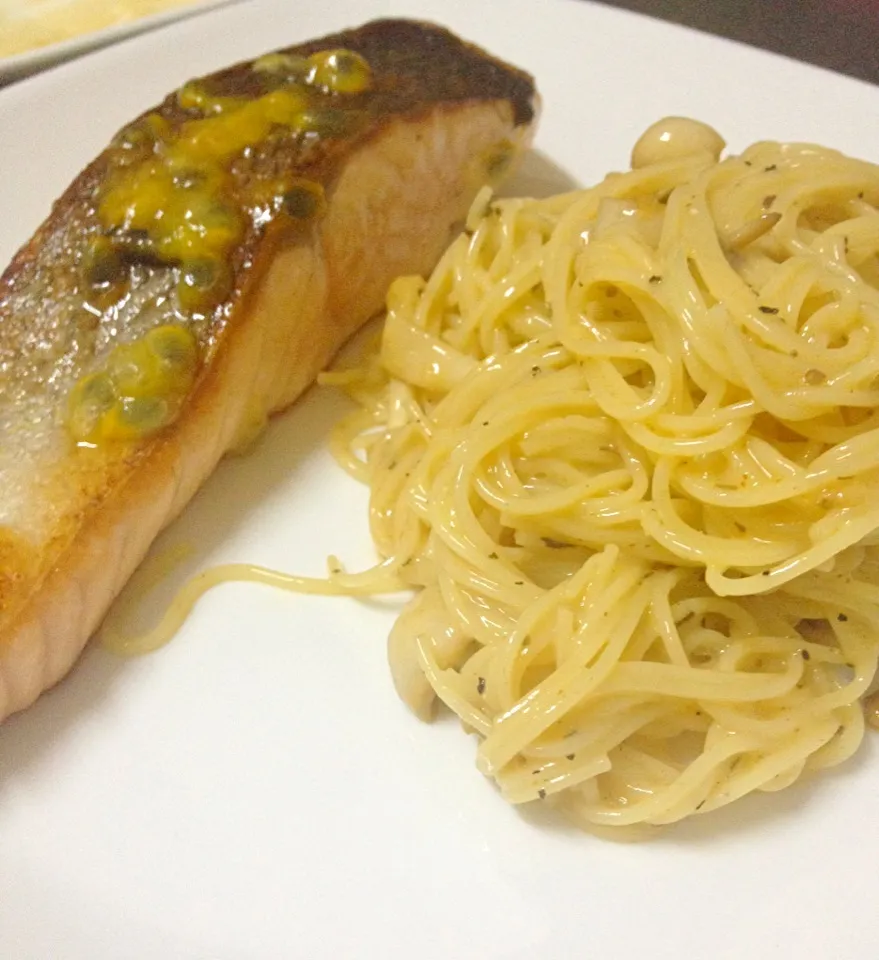 Pan fried pomegranate salmon with creamy angel hair pasta and japanese mushrooms.|eveさん