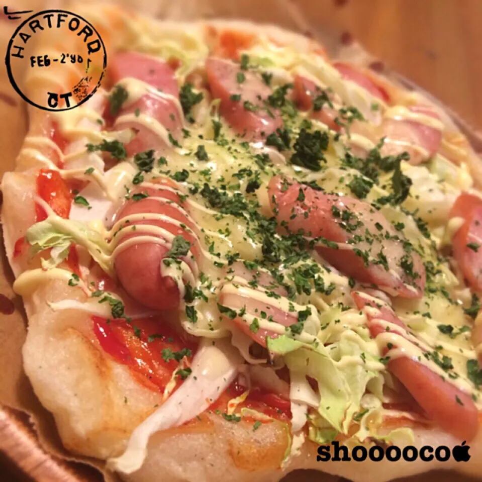 帰るや否や。『なんか作って？』キャベツとウィンナーの餅ピザ|shoooocoさん