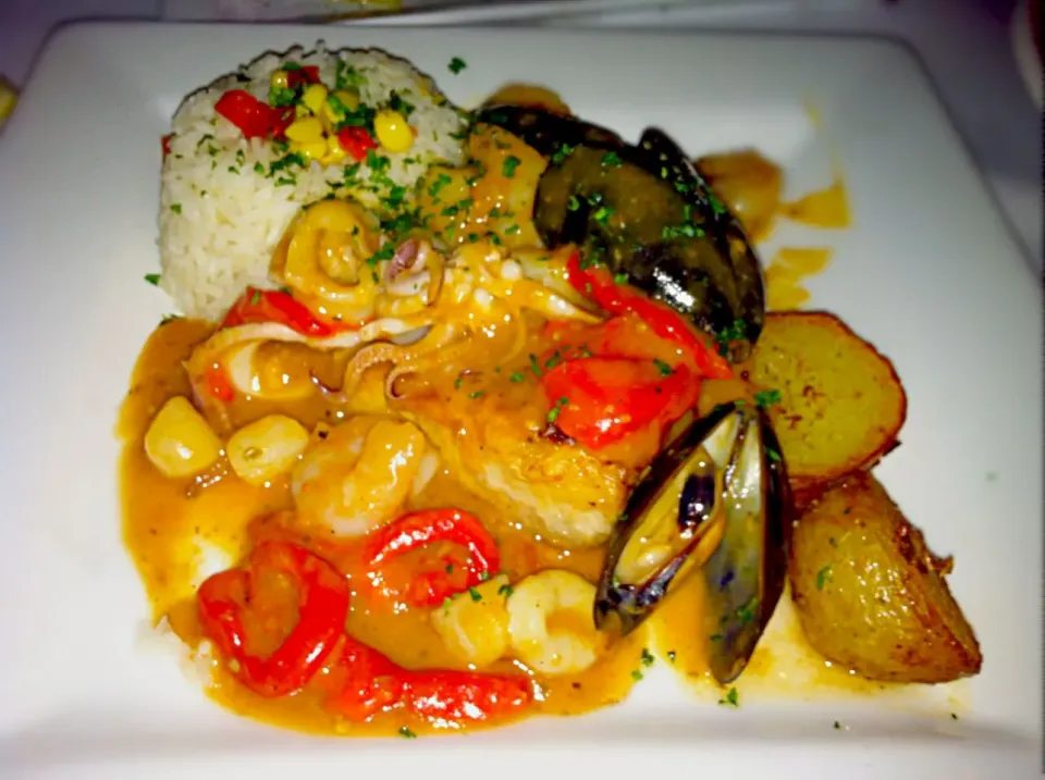 Peruvian seafood and rice dish at Mango restaurant.|Jihollandさん