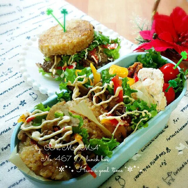 りるのんさんのグリルプレートで買うより安い！あの焼きおにぎり🌸で
ライスバーガーのお弁当|ONI*MAMA*さん