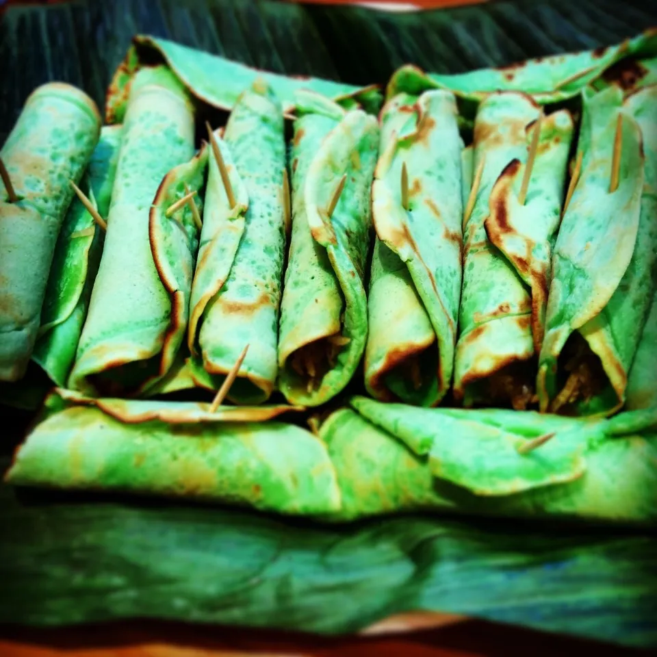 Snapdishの料理写真:Kueh Dadar/Malaysian coconut pancakes|Nicky Jonesさん