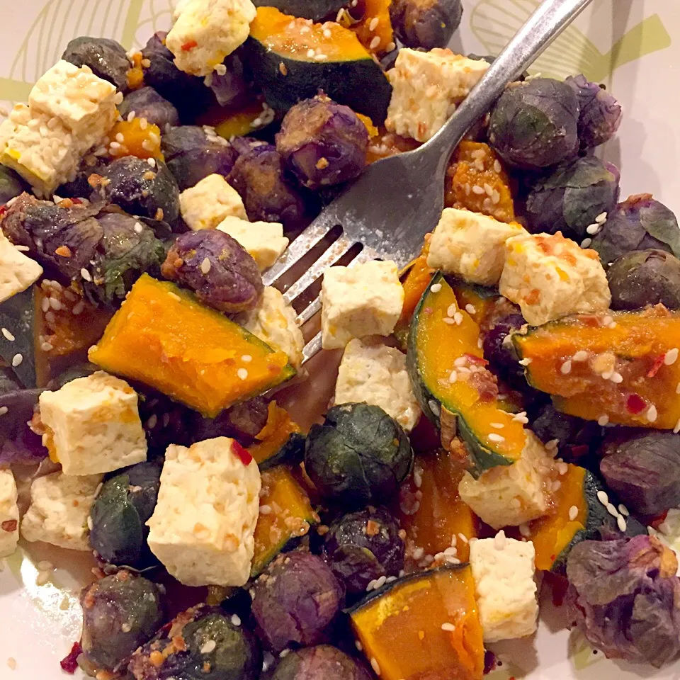 Snapdishの料理写真:Kabocha squash, tofu and purple Brussels sprouts in a miso-coconut sauce with sesame seeds|georgianaさん