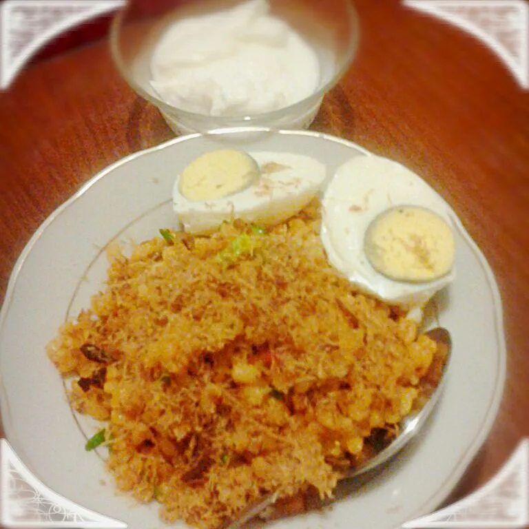 Fried wheat served with salty egg (telur asin) and yogurt|Debby Muis Bandaşさん