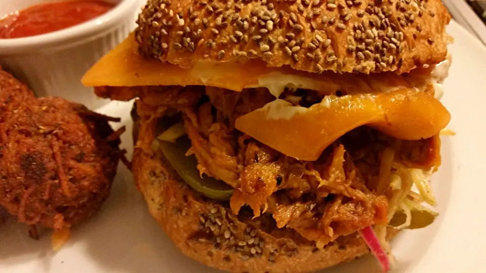 BBQ pulled pork with Kim chi on a Chia seed bun with deep fried spaghetti balls.|CherylAnn Wheelerさん