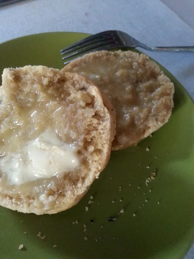 caramelized onion and rosemary scone with obscene amount of butter.|Polly Gelfusoさん