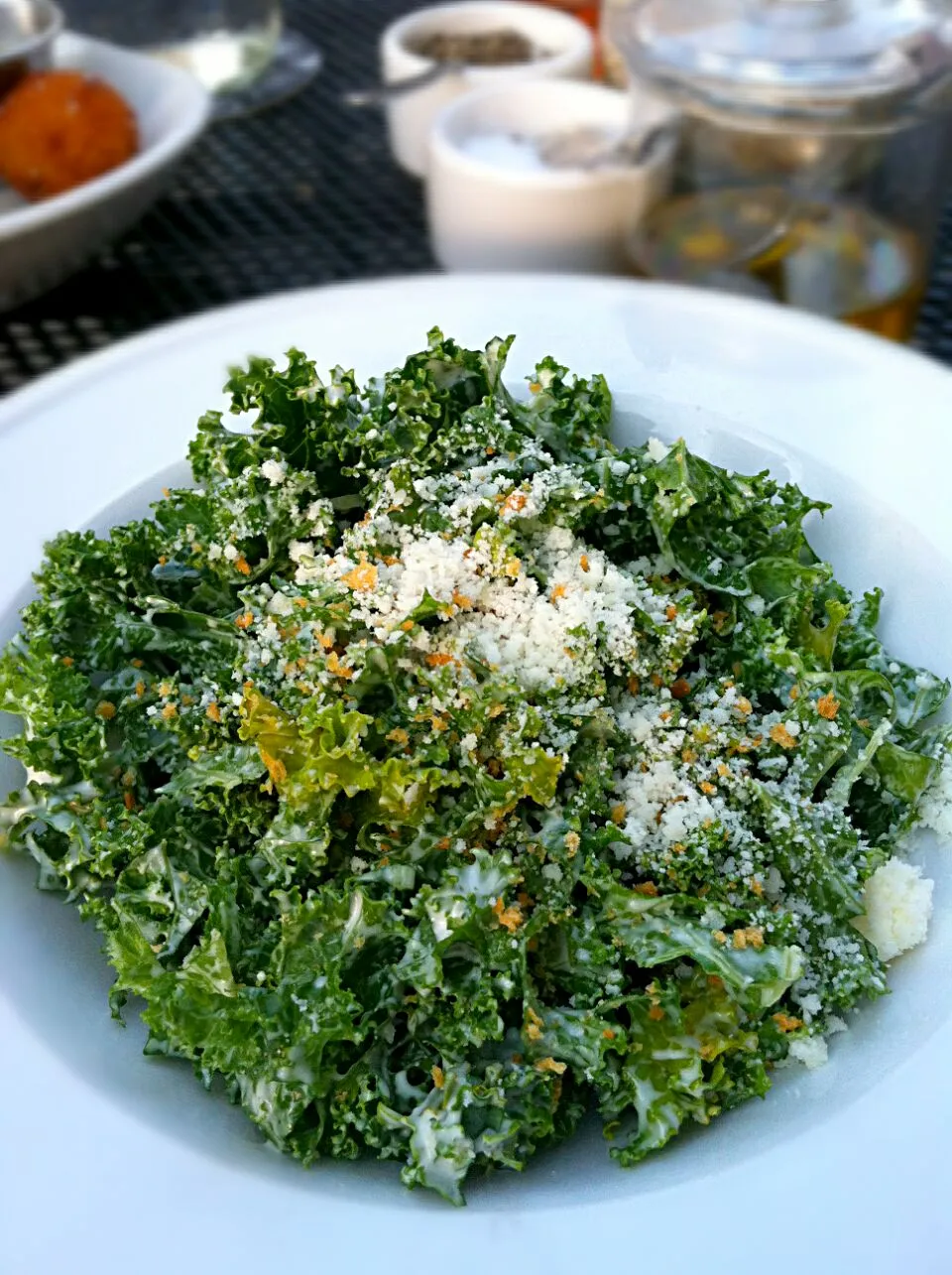 Snapdishの料理写真:Shaved Kale Salad with creamy anchovy dressing topped with crispy bread crumbs at Pastaria St Louis Missouri, USA.|Jihollandさん