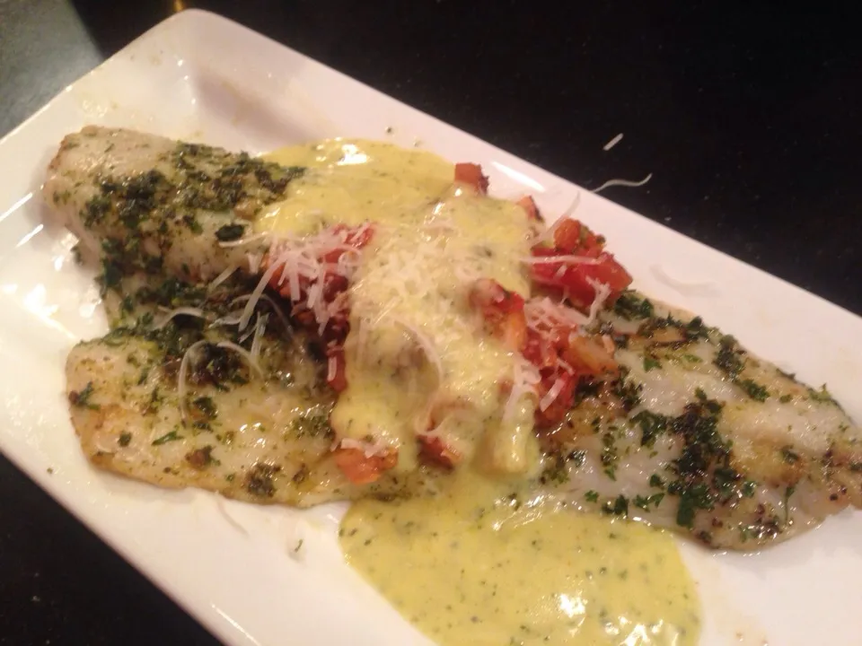 Snapdishの料理写真:Grilled pesto walleye with roasted bruschetta and pest hollandaise|peggy waldonさん