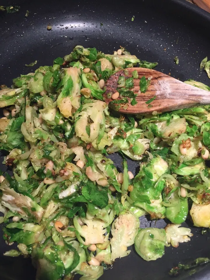 shaved brussel sprouts sauteed in garlic olive oil with pine nuts|Dara Braddockさん