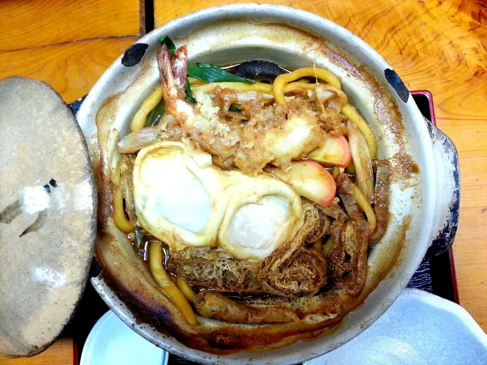 本日、味噌煮込み初め♪　Stewed udon noodles with miso (soybean paste) soupe on shrimp TENPURA called MISO NOKOMI UDON .|BUBUさん