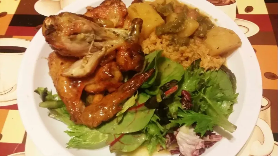 Roasted Chicken Glazed with apricot sauce slowly cooked.  salad  rice over beans|Frank Ortizさん