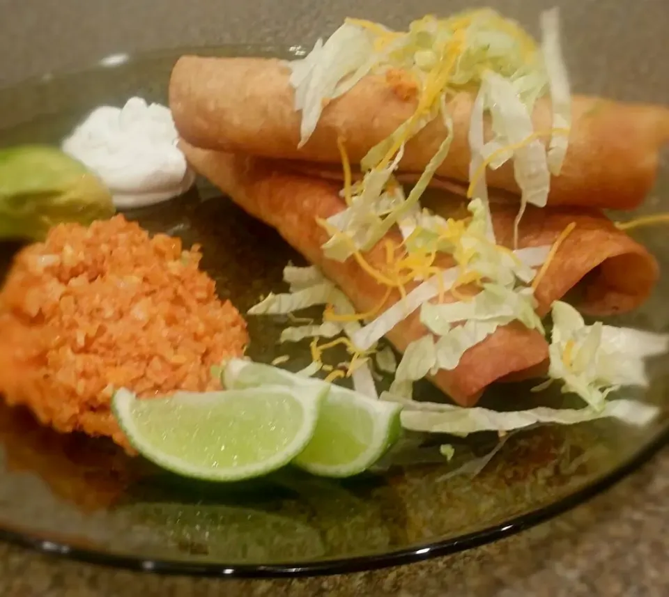 Snapdishの料理写真:low carb flautas with cauliflower Mexican rice|Maya Evansさん