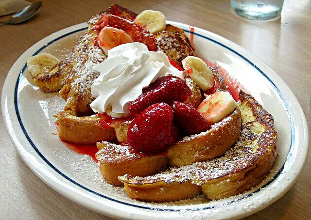 Snapdishの料理写真:Strawberry Banana French Toast #Breakfast/Brunch with Family at IHOP #Bread #Fruit #Beignet / Pancake  #Main dish ❤ ❤ ❤|Alisha GodsglamGirl Matthewsさん