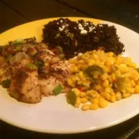 Snapdishの料理写真:Blackened tilapia, Black rice with scallions, garlic, olives and mexican corn.|fricks foodさん