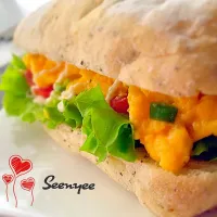 Snapdishの料理写真:I ❤️ Cooking | Eggcellent Lunch ~ Scrambled eggs focaccia sandwich. 🍞🍳🍅|Seenyee芯亦さん