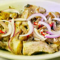 Ilocos "Dinakdakan". - a Filipino dish. Grilled Pork Belly, sliced into bits. With vinegar, onion, ginger and chili. Best with beer. 

 #dinakdakan|Eugrafia RVさん