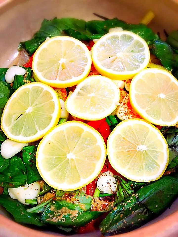 Snapdishの料理写真:Preparing my "steamed fish in lemon and basil"|Laarni Nabongさん