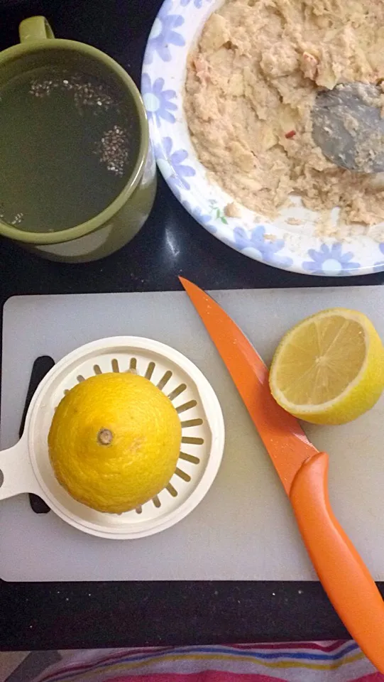 Snapdishの料理写真:My breakfast. Hot lemon w chia seed and oatmeal in heated apple juice (nosugar) topped with cinnamon and minced apple|SJさん