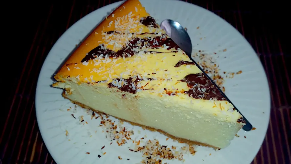 cheesecake, at the bottom of vanilla wafers. and almonds, with toasted coconut ...|Matthew NLさん