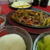 Snapdishの料理写真:Shrimp fajitas with all the fixings (including homemade flour tortillas) #shrimp #fajitas #mexicanfood #texmex #foodie #foodpic #foodporn  #foodgasm|Culinary Kissesさん