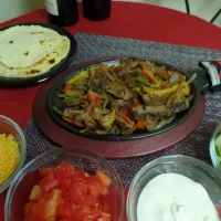 Snapdishの料理写真:Shrimp fajitas with all the fixings (including homemade flour tortillas) #shrimp #fajitas #mexicanfood #texmex #foodie #foodpic #foodporn  #foodgasm|Culinary Kissesさん