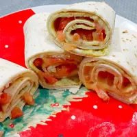 a tortila roll with eeg and tomato salad|Serly Wijayaさん