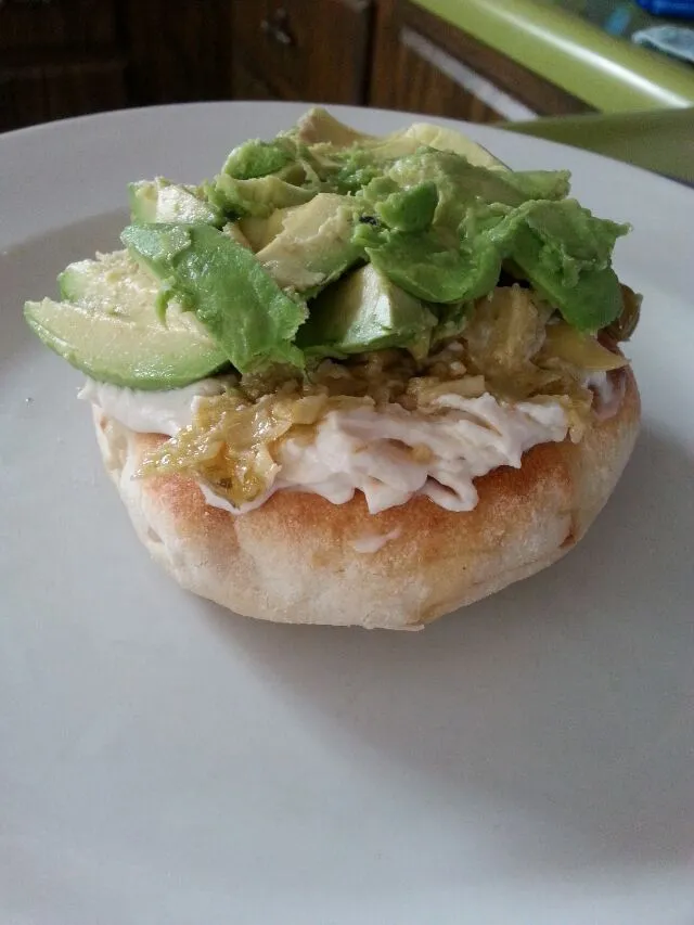 bialy bagel with butter,  cream chz,  artichoke bruschetta, and avocado.|Polly Gelfusoさん